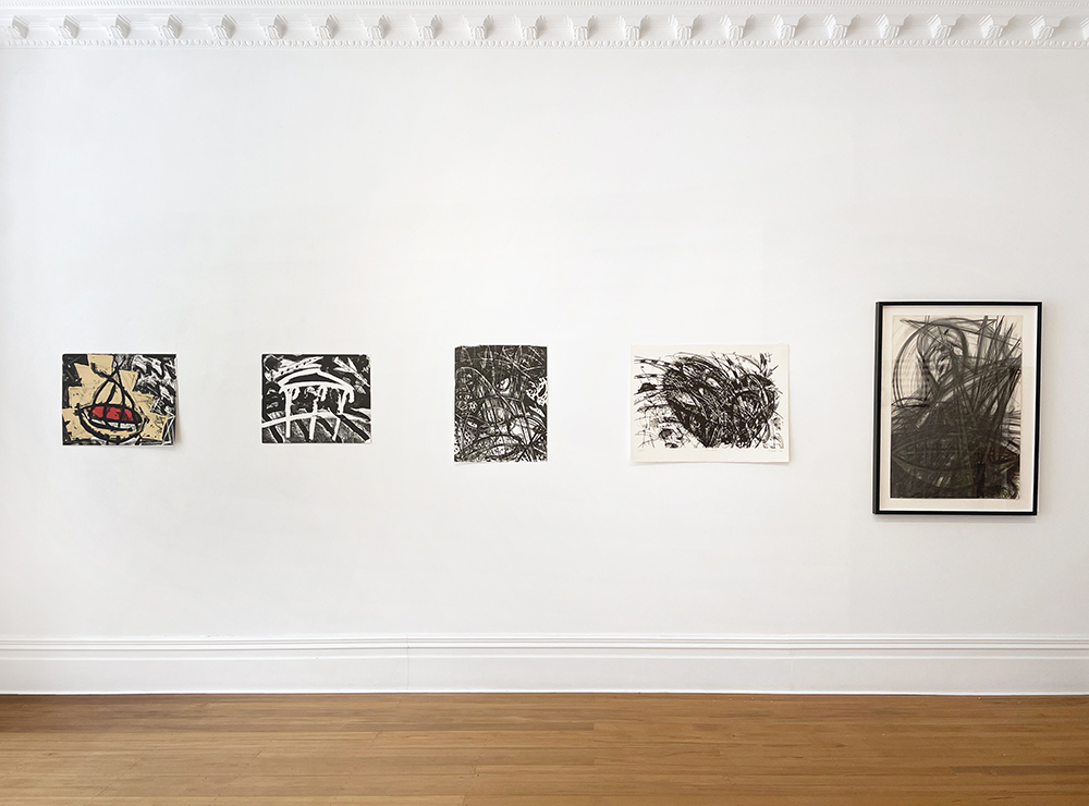 Installation view of 4 unframed lithographs and 1 framed charcoal drawing From Left to Right: 'Kiva: Anasaz', 'Temple', 'Manoeuvre', 'Two Hearts', 'Untitled'